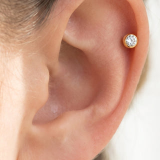 Gold Labret Piercing – selection on linen