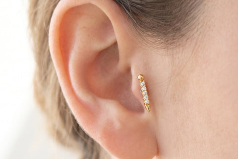 Piercing Tragus Dorado